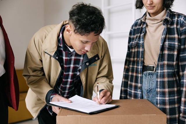 two%20tenant%20signing%20a%20lease%20as%20a%20landlord%20oversees two%20tenant%20signing%20a%20lease%20as%20a%20landlord%20oversees